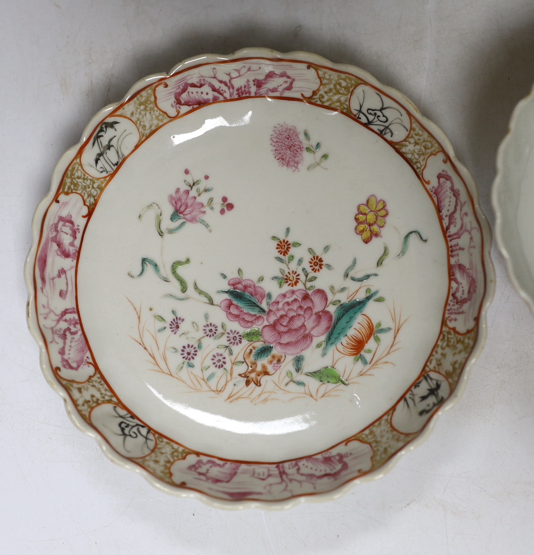 A Chinese famille rose bowl and dish and two similar bowls, all Qianlong period, largest diameter 23cm